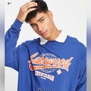 ASOS DESIGN oversized long sleeve polo t-shirt in navy with Lakewood print